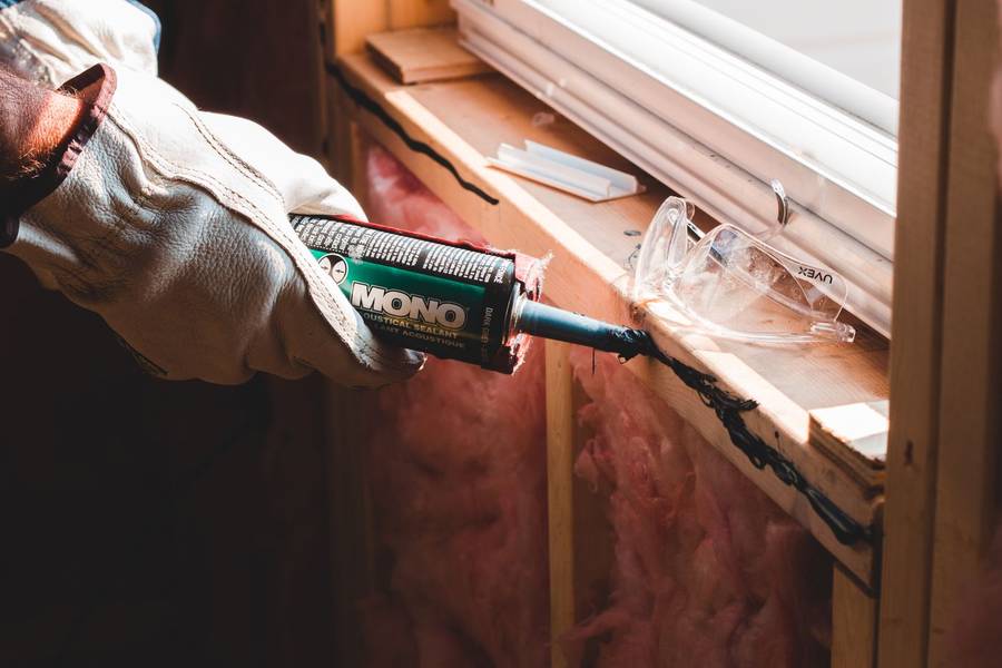 Sealant being run along a seam